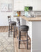 Caitbrook Bar Height Bar Stool - World Furniture Gallery (Newark, CA)