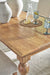 Rybergston Dining Table - World Furniture Gallery (Newark, CA)