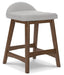 Lyncott Counter Height Bar Stool - World Furniture Gallery (Newark, CA)