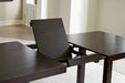 Neymorton Dining Extension Table - World Furniture Gallery (Newark, CA)