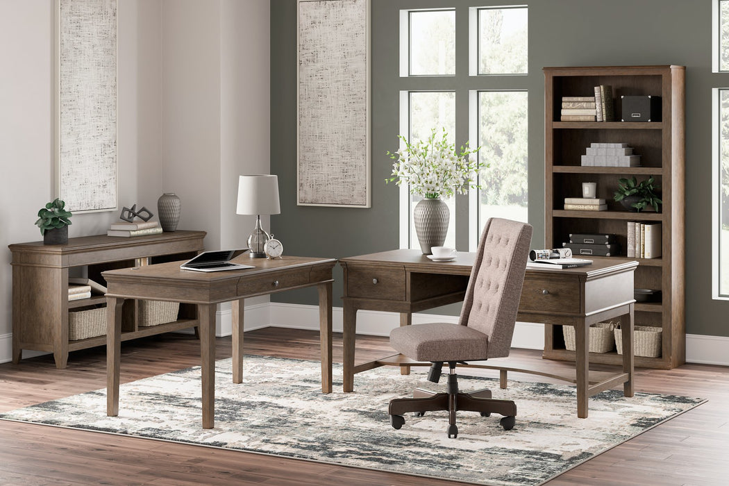 Janismore Home Office Storage Leg Desk - World Furniture Gallery (Newark, CA)