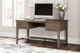 Janismore Home Office Storage Leg Desk - World Furniture Gallery (Newark, CA)