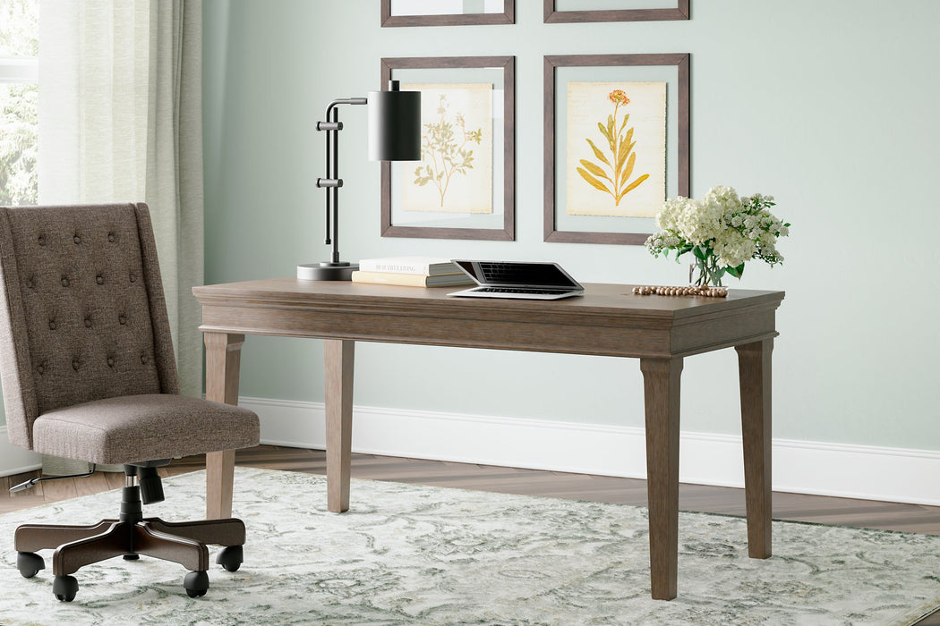 Janismore 63" Home Office Desk - World Furniture Gallery (Newark, CA)