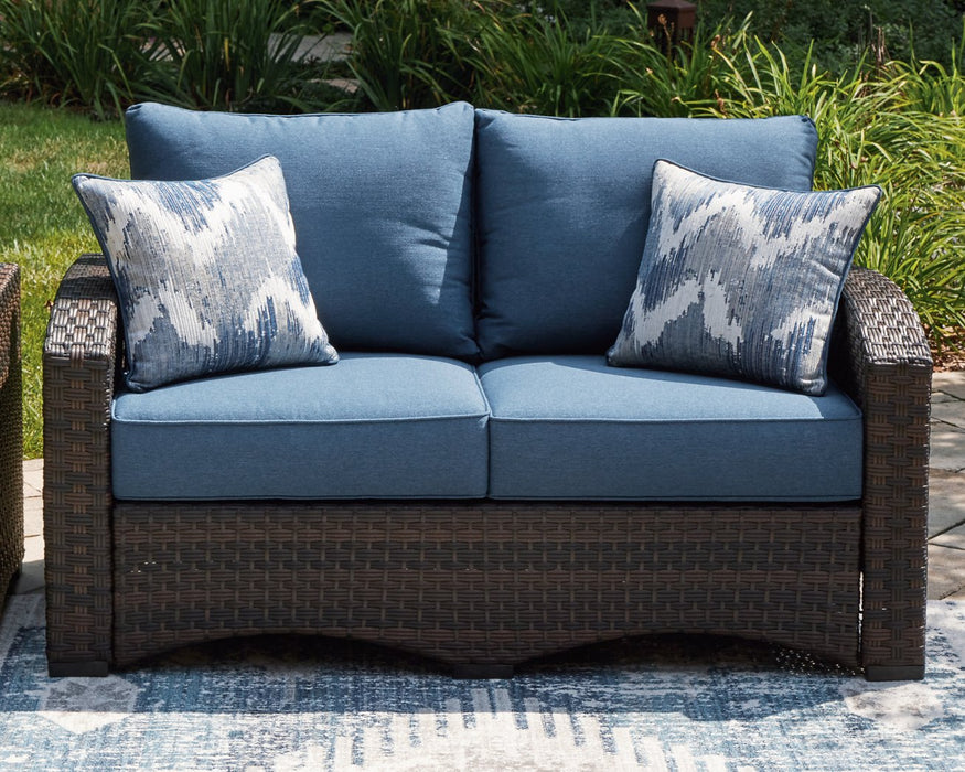 Windglow Outdoor Loveseat with Cushion - World Furniture Gallery (Newark, CA)