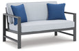 Fynnegan Outdoor Loveseat with Table (Set of 2) - World Furniture Gallery (Newark, CA)