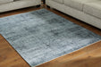 Rhysill 5' x 7' Rug - World Furniture Gallery (Newark, CA)